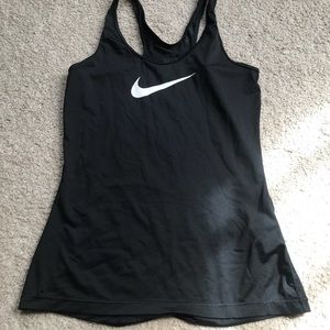 Two Small Nike tanks